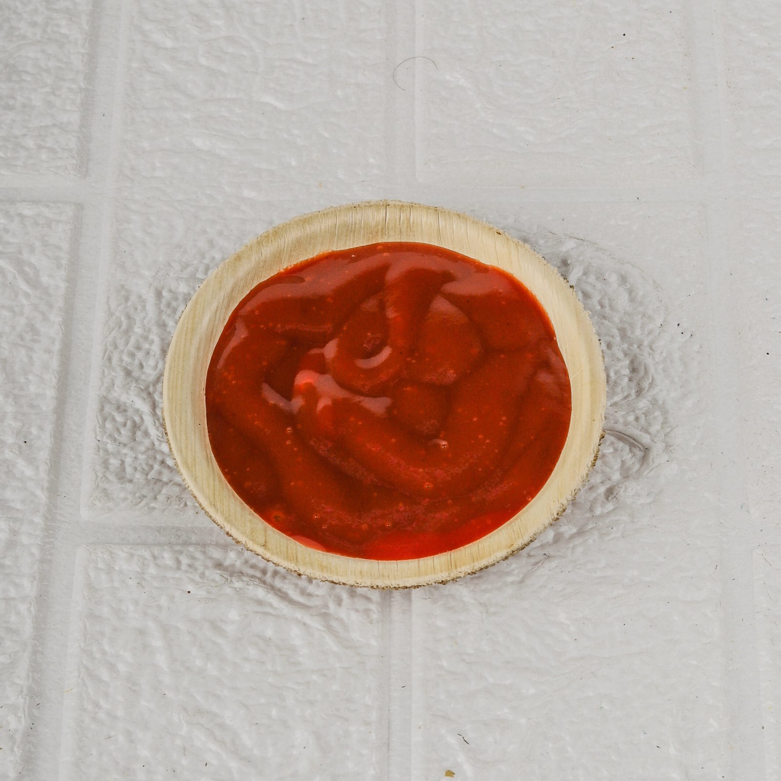 4 inch sized round disposable bowl with food